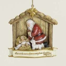 Thumbnail Kneeling Santa In Manger Ornament