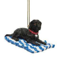 Item 294040 Dog On Beach Towel Ornament