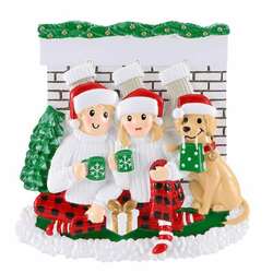Item 459674 Family Of 2 Sitting In Front Of Fireplace Ornament